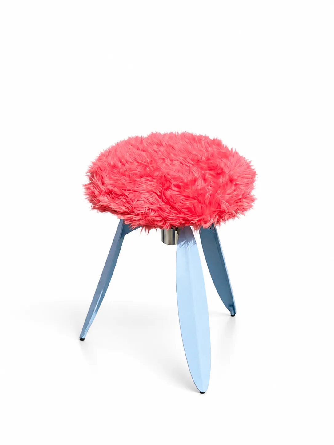 The fur stool from three-quarter view, its blue legs splayed