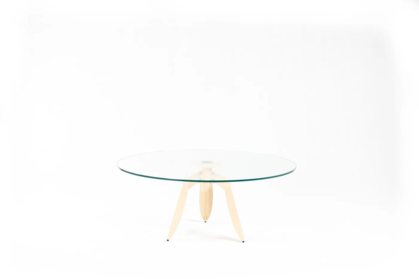 The Dot table's glass top seen close to eye level