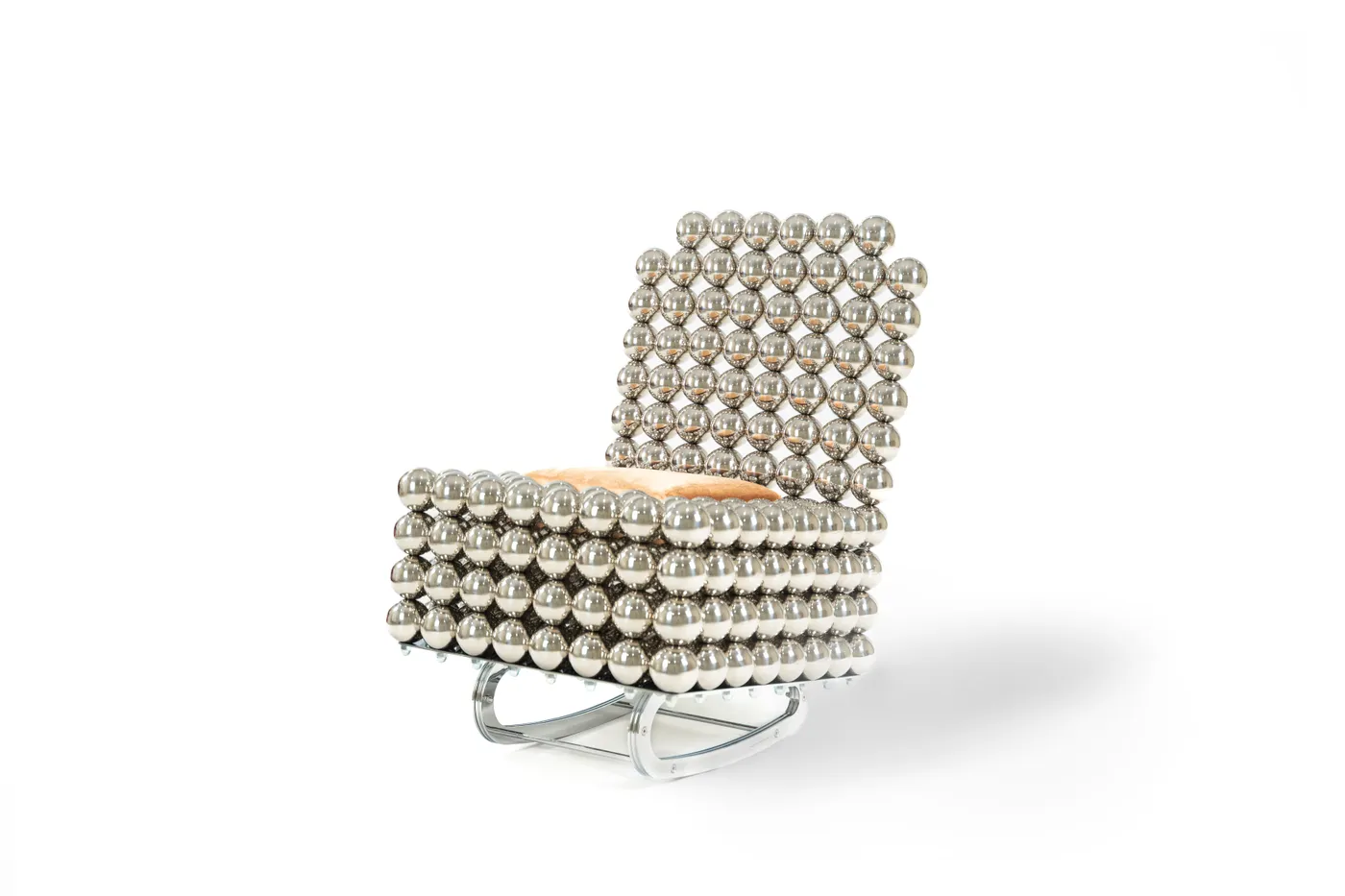 Wishes rocking chair in chrome spheres, three-quarter view